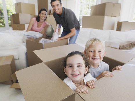 Professional movers handling household items in Islington