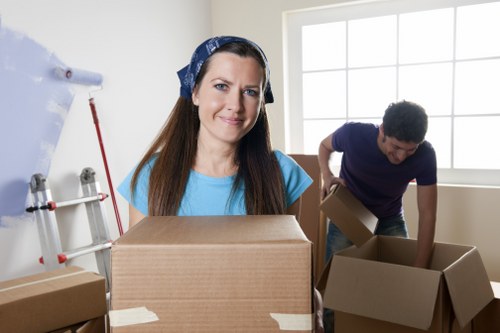 Professional movers loading items into a truck